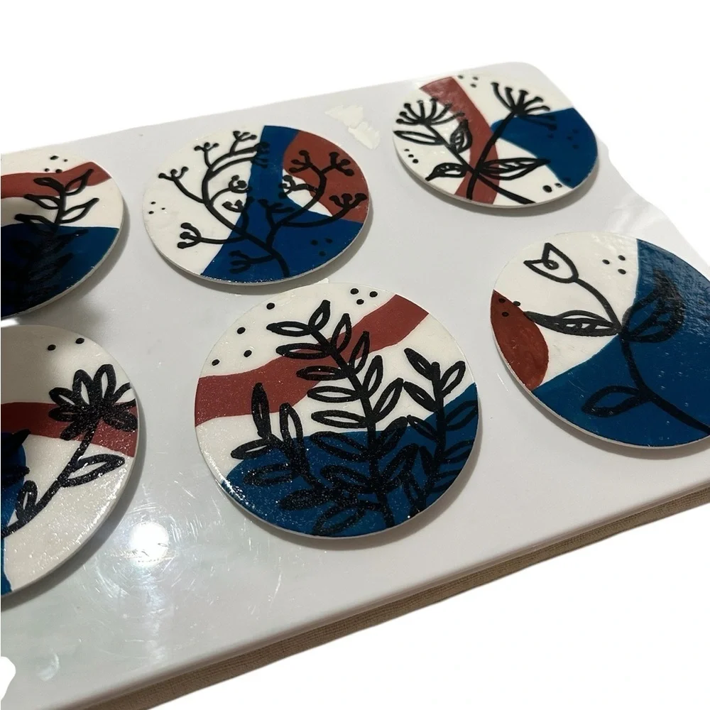 Handmade Drink Coasters With Floral Design and Blue and Brown Patterns